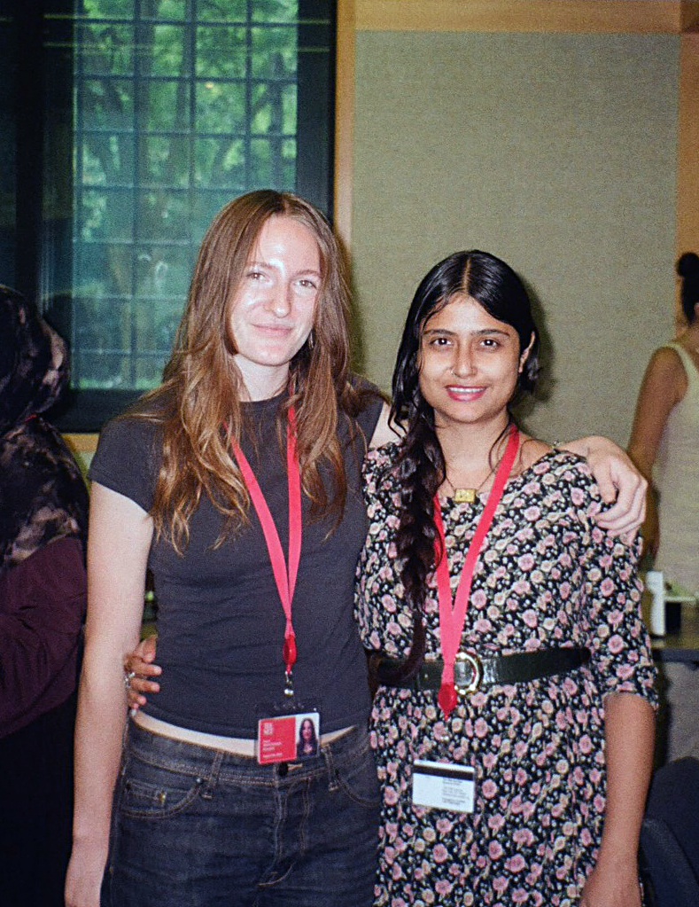 A Metropolitan Museum intern (standing left) with their friend at an event at the museum.